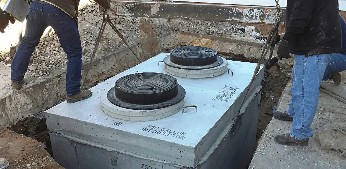 Grease trap installation for a commercial property drainage system in Detroit, MI