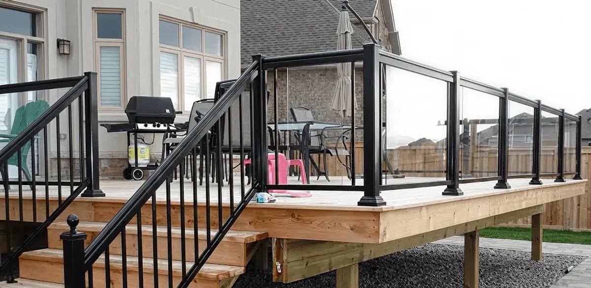 Handrail installation on a deck staircase for safety and code compliance in Detroit, MI